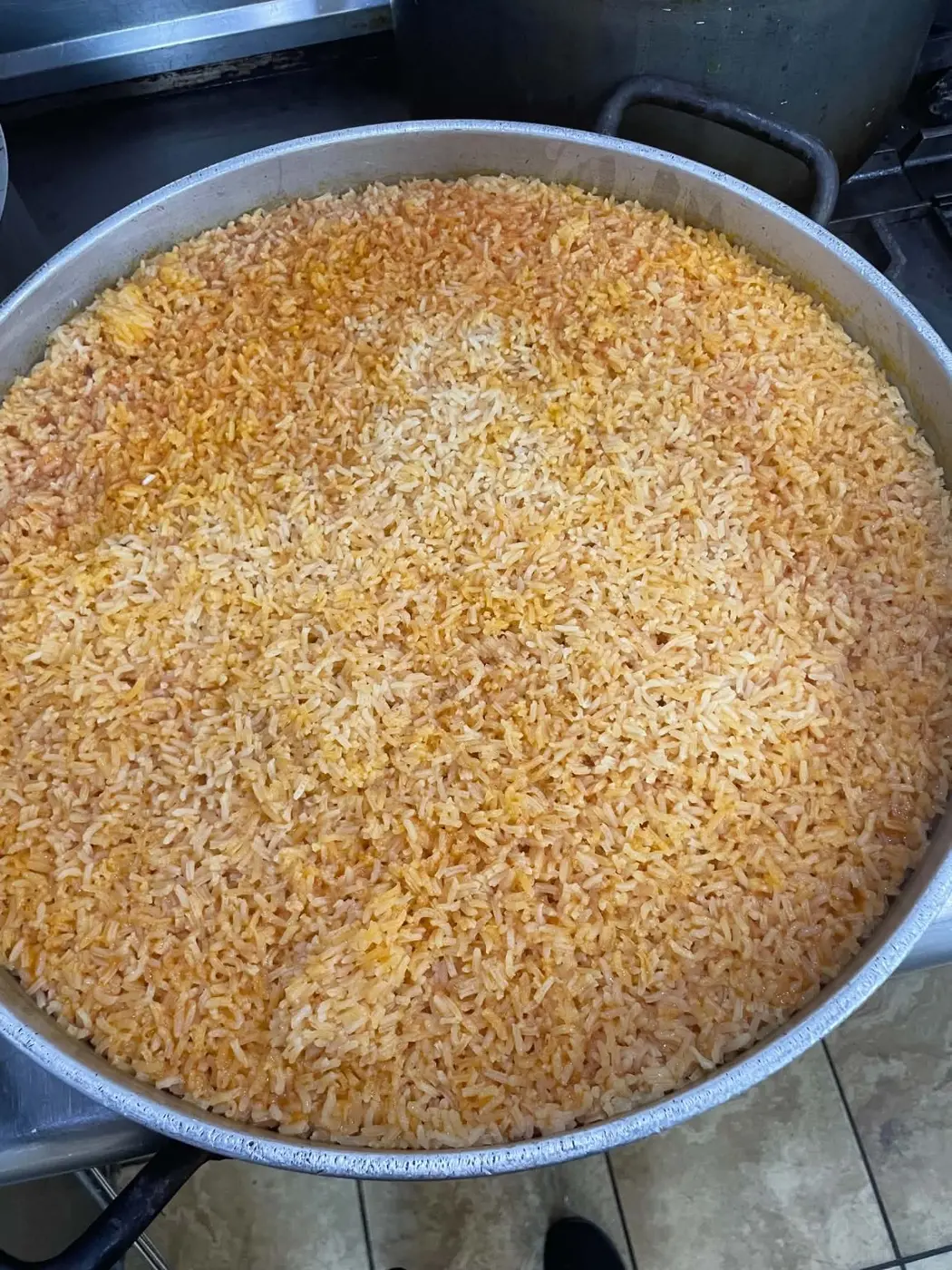 A full pot of freshly prepared golden rice