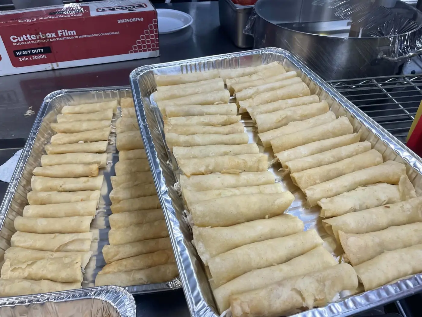 Catering trays lined and ready for cooking